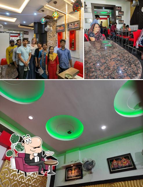 The image of interior and beverage at Marwadi Basa
