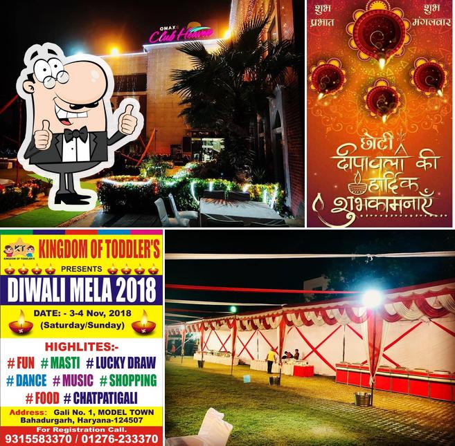 Look at this image of OMAXE CLUB-Restaurant ,Swimming Pool,Banquet & Lawns