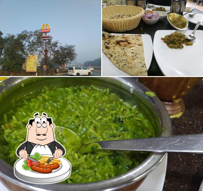 The image of KAILASH SAROVAR, KHOPOLI’s food and exterior