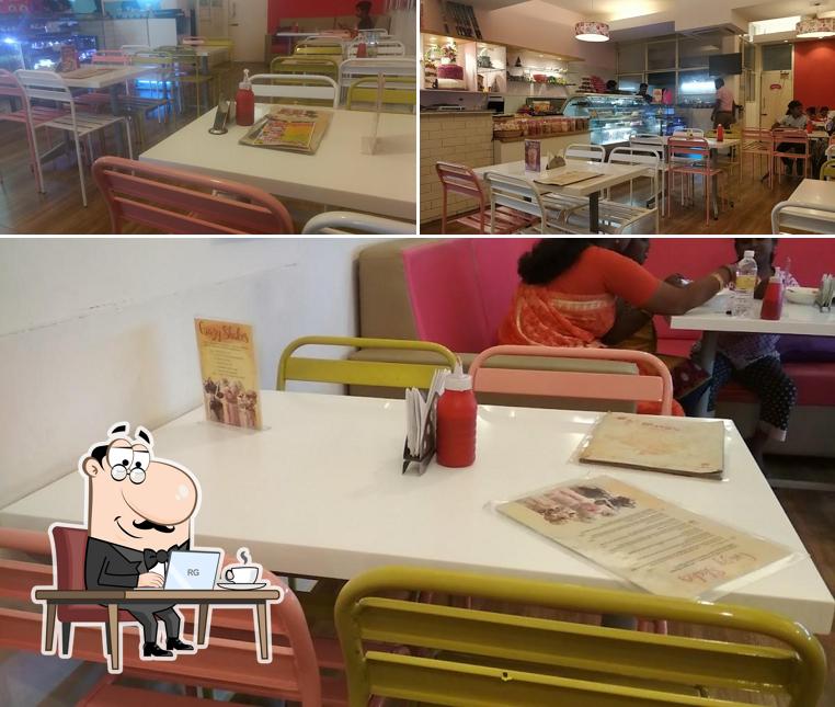 The interior of Puppy's Bakery - Exclusive Desserts Continental Cuisine Instagrammable Café in Madurai - Anna Nagar