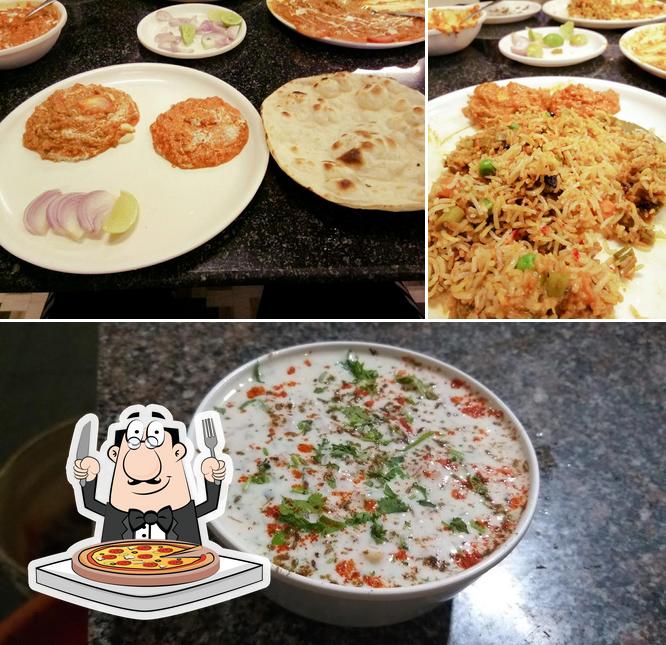 Get pizza at Hotel Mauli Park Veg Restaurant Karad