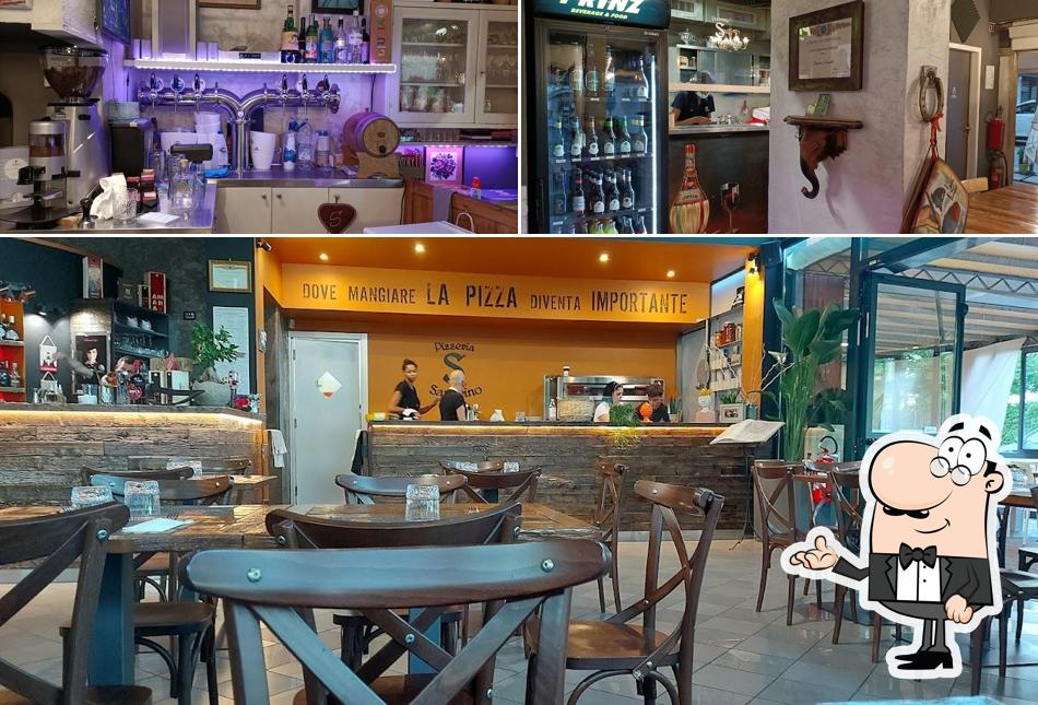 Siediti a un tavolo di Pizzeria Da Sandrino