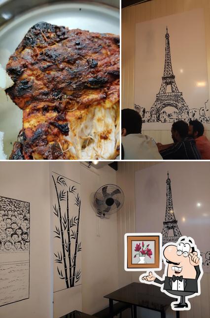 Check out the photo displaying interior and pizza at ChickBoook