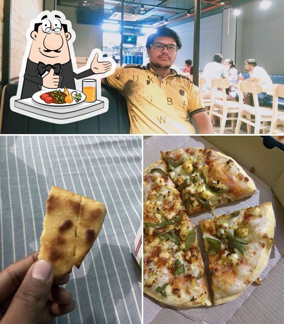 The picture of Domino's Pizza Prem Nagar, Dehradun’s food and interior