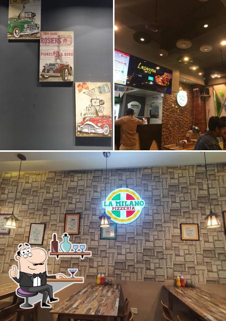 The photo of La milano pizzeria’s interior and exterior