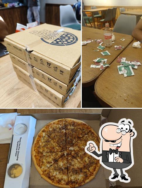The photo of Taranovas Pizza’s interior and pizza