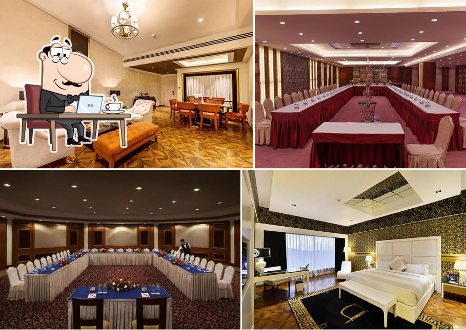 Take a seat at one of the tables at HOTEL BLUE ORCHID