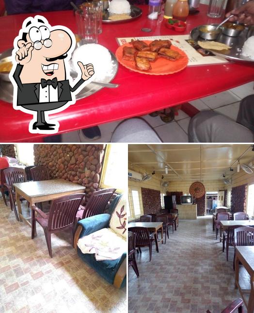 The interior of New Rajshree Dhaba & Restaurant