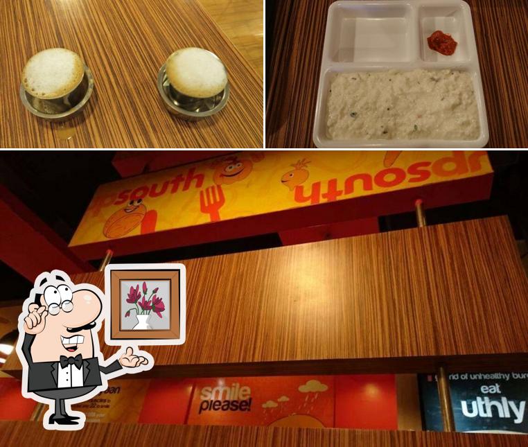 This is the picture displaying interior and food at Upsouth Phoenix Mall Pune