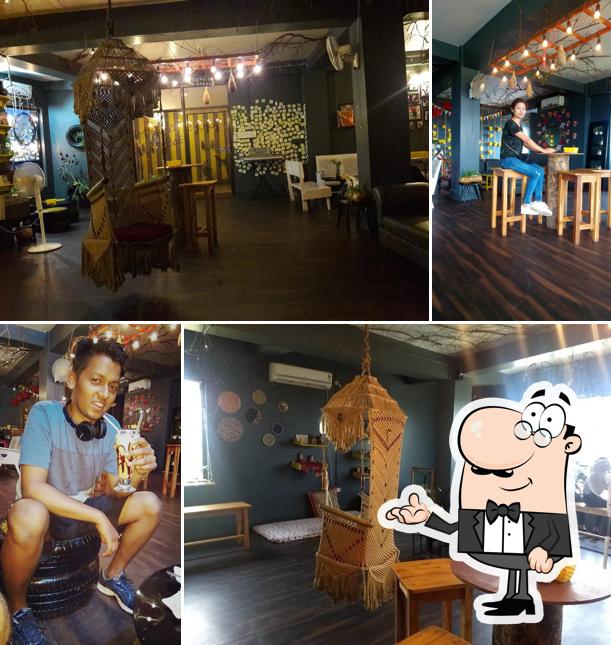 Take a seat at one of the tables at Cafe Bae
