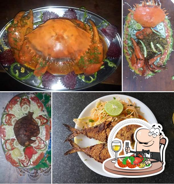 Try out various seafood dishes offered by Varsha Lunch Home