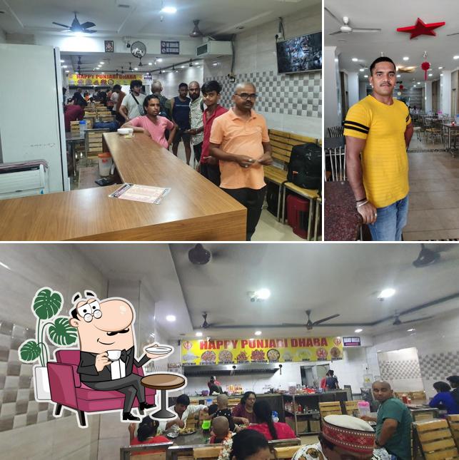 Check out how Happy Punjabi Dhaba Pure Veg Family Restaurant looks inside