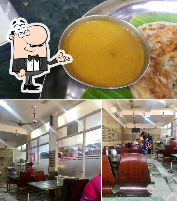 Check out the photo showing interior and food at Hotel Chandra veg & non-veg sigma
