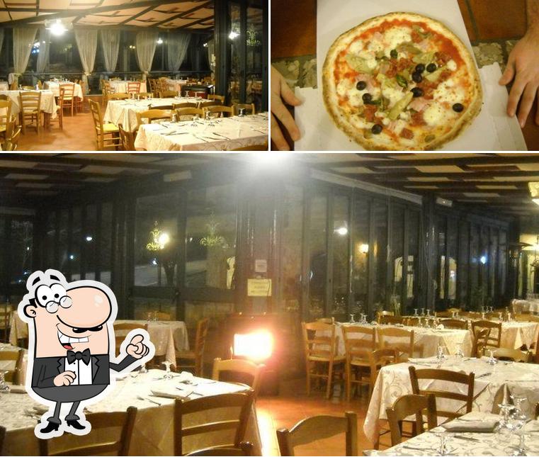 Questa è la immagine che mostra la interni e pizza di La Cantinella