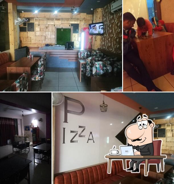 The interior of Enjoy Pizza Plus ਇੰਜੋਏ ਪੀਜਾ ਪਲੱਸ