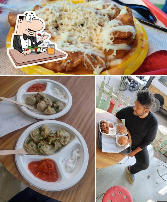 Check out the picture showing food and dining table at Wonder momos