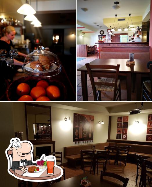 La foto della tavolo da pranzo e cibo di Lokal Pr' Sodiš