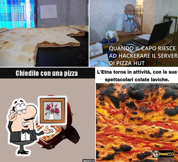 La immagine di interni e cibo da Focacceria da Capo