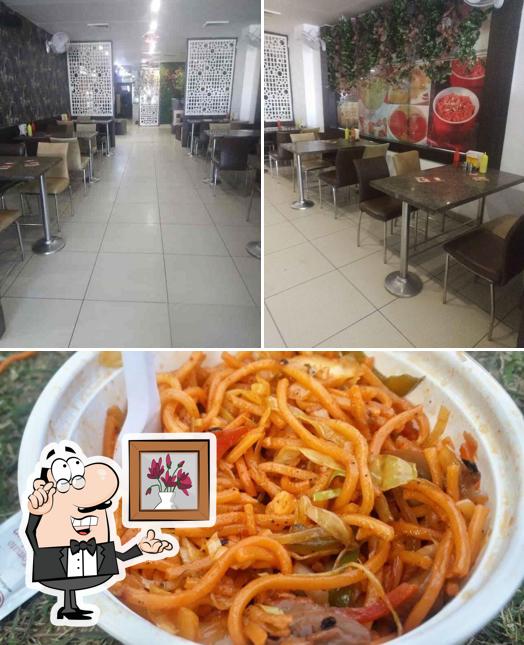 This is the photo depicting interior and food at Param Food Complex