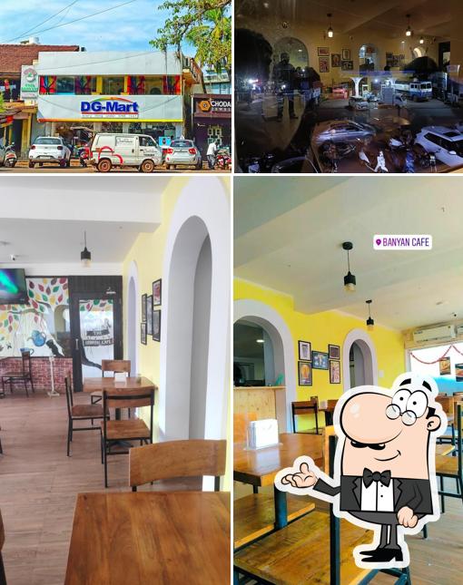 Take a seat at one of the tables at The Banyan Cafe Restaurant and Bar