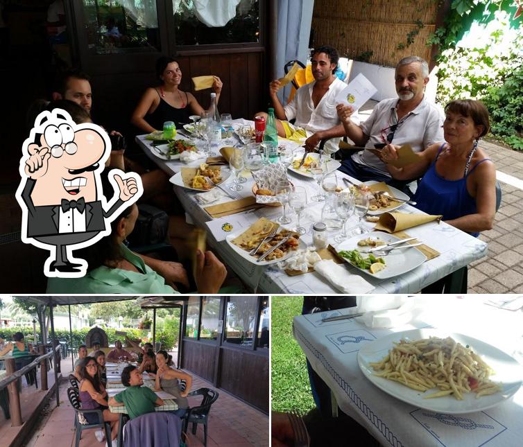 Questa è la foto che raffigura la interni e cibo di Riva Verde Bolsena stabilimento balneare ristorante bar appartamenti