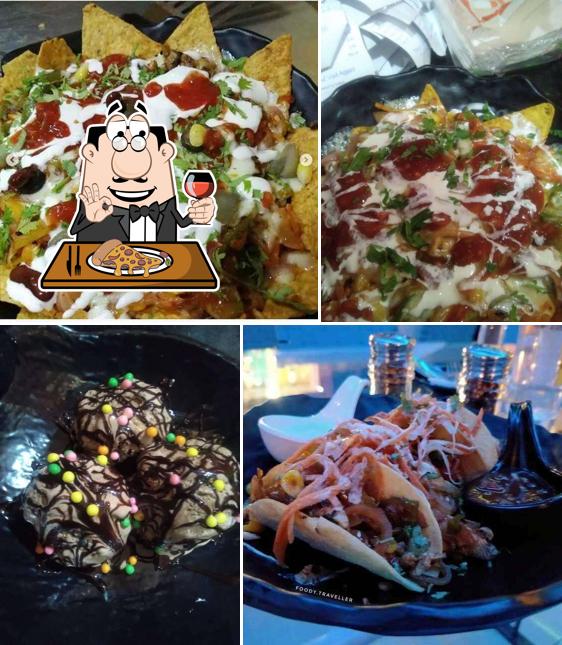 Get pizza at World Of Tortillas