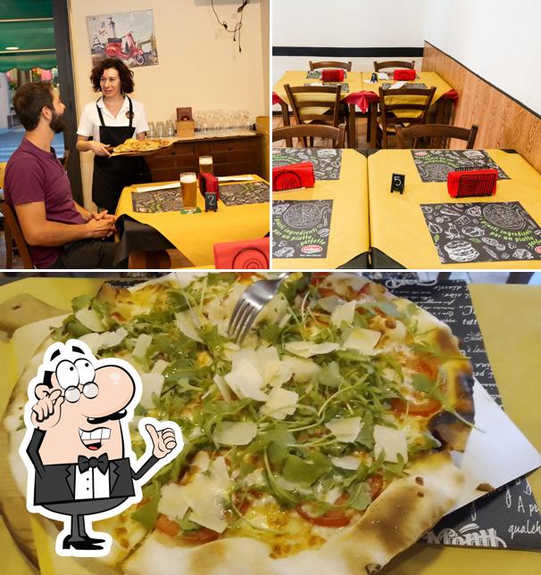 Guarda la foto che raffigura la interni e cibo di Pizzeria New York