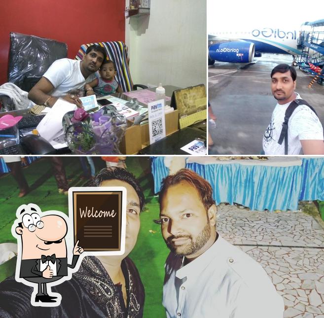 Look at the picture of Papa ji solution & internet cafe