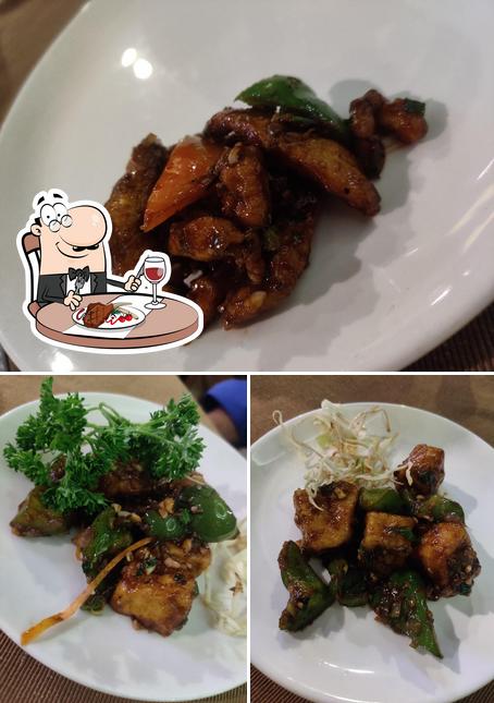 Get meat dishes at Monis Hotel