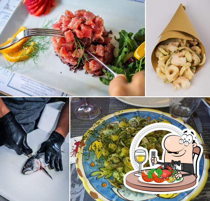 Prenditi la cucina di mare a Kalamaro Fritto Osteria