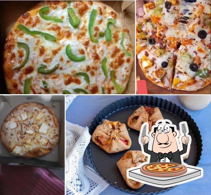 Try out pizza at THE FOOD CLUB ( TFC RESTAURANT & PIZZA ) SARDHANA