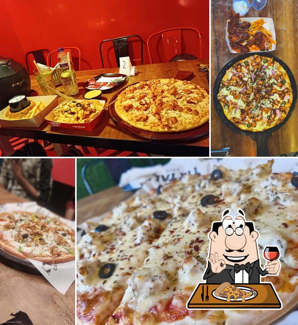 Try out pizza at TikTalk Cafe