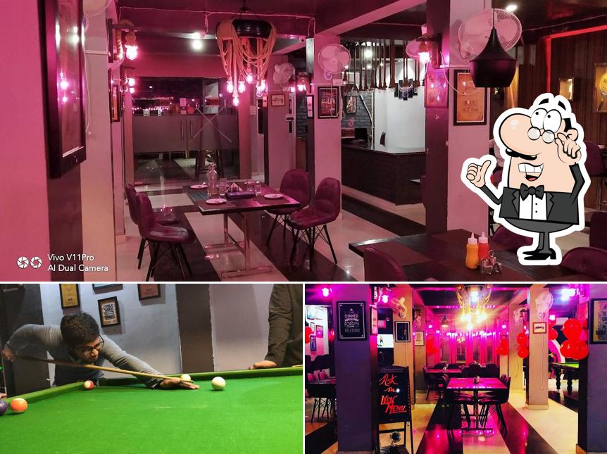 Take a seat at one of the tables at BrooD's play N Eat