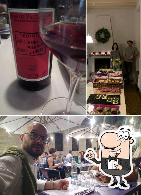 La foto di interni e bevanda da Croce di Malta Caffè Cucina Vini