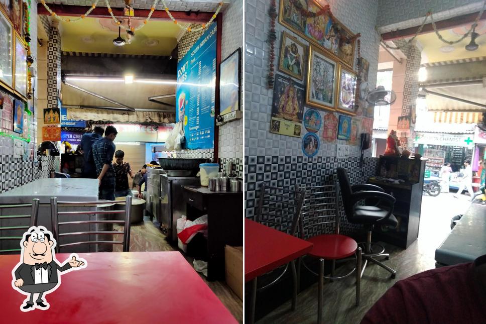 Take a seat at one of the tables at Durai South Indian Cafe