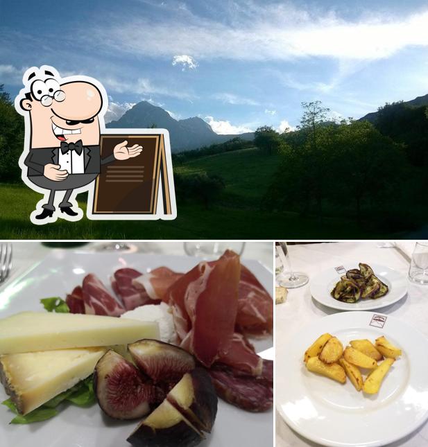 Puoi goderti l'aria fresca da seduto all'esterno di Ristorante GRAN SASSO San Gabriele