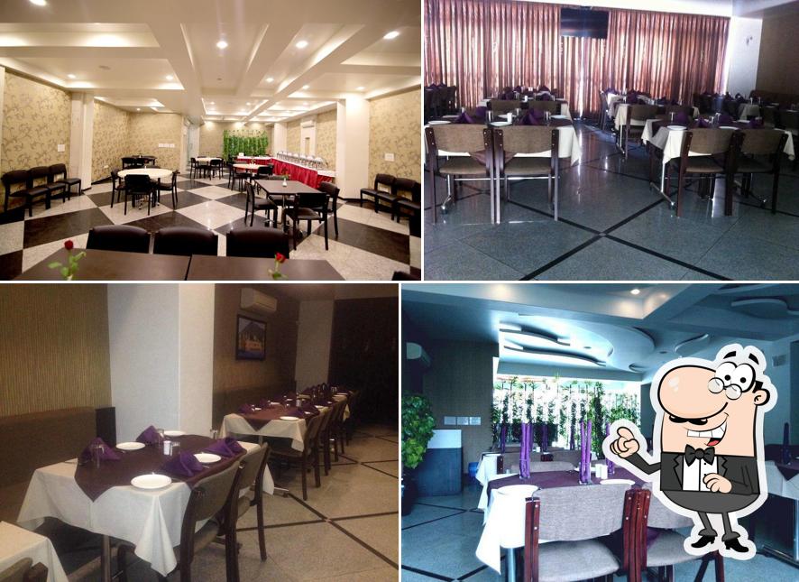 Take a seat at one of the tables at Tri Color Restaurant