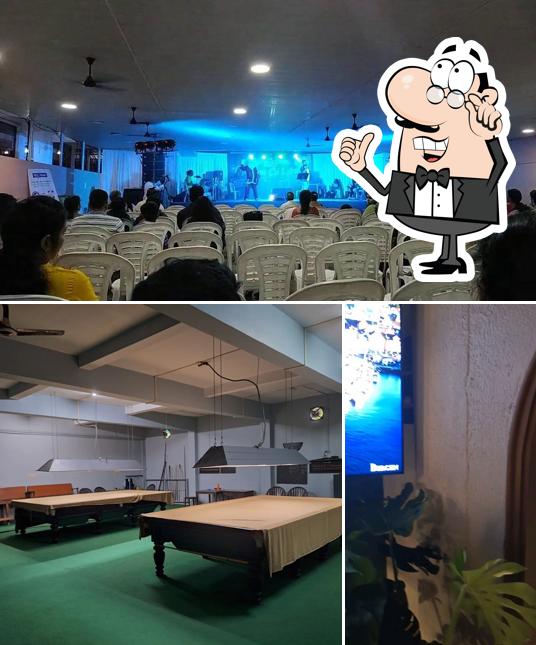 Take a seat at one of the tables at Rama Varma Club, Ernakulam