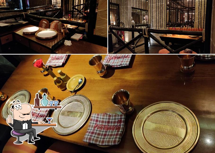 Take a seat at one of the tables at Peshawri