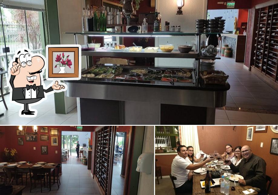 Sente em uma das mesas no Piatto di Nonno