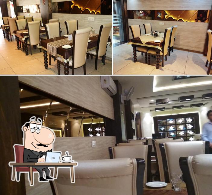 Take a seat at one of the tables at Flames