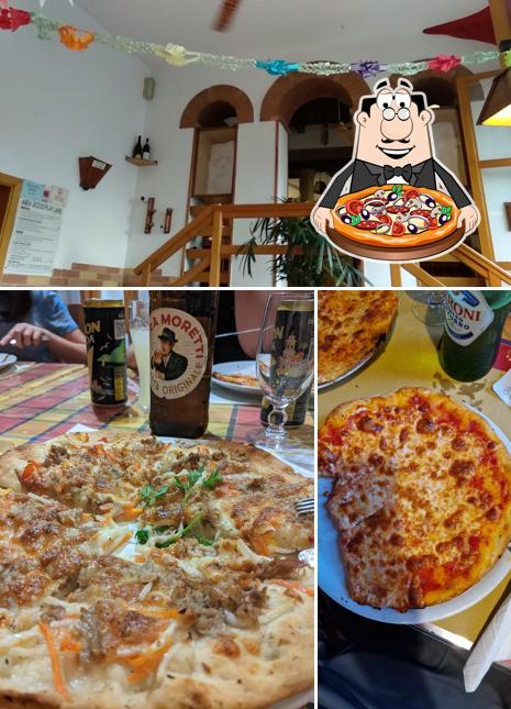 A Pizzeria Rosticceria Arcobaleno, puoi provare una bella pizza