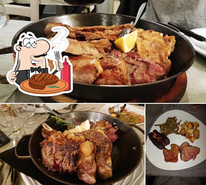 Prenditi i un pasto a base di carne a Trattoria Da Rampon di Cazzola Elisabetta