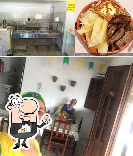 A imagem da interior e comida no Restaurante e Pizzaria Getúllio's