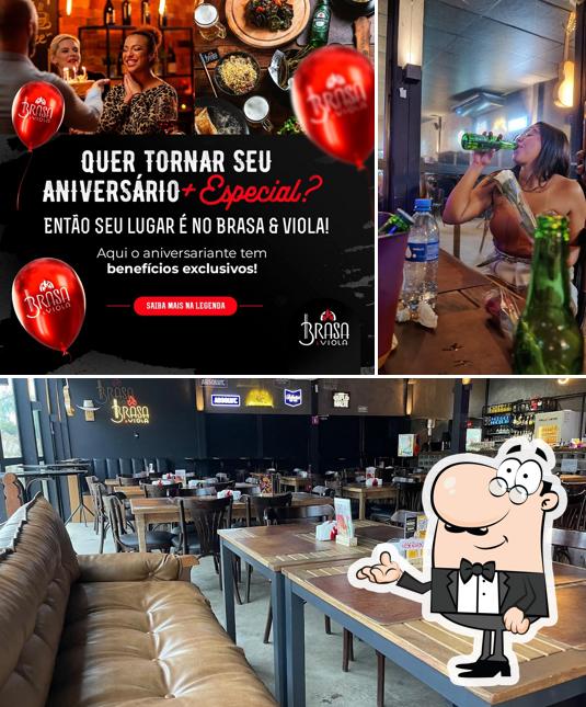 O interior do Brasa E Viola - Steakhouse É Bar