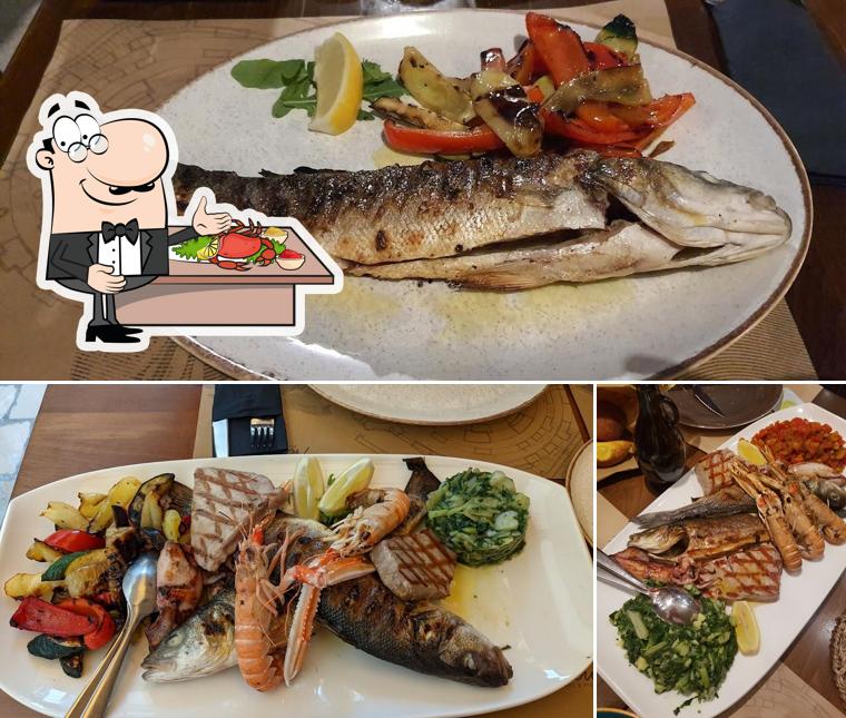 Prenditi la cucina di mare a Restoran 4 Kantuna