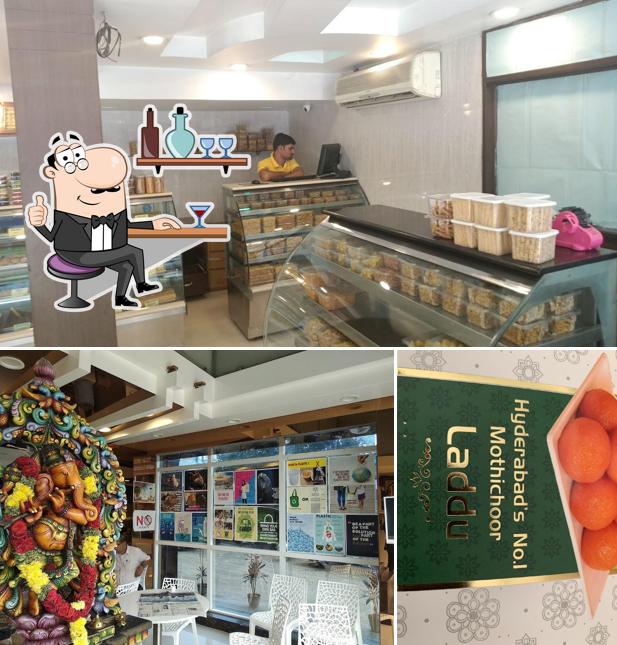 Take a seat at one of the tables at Olive Mithai Shop