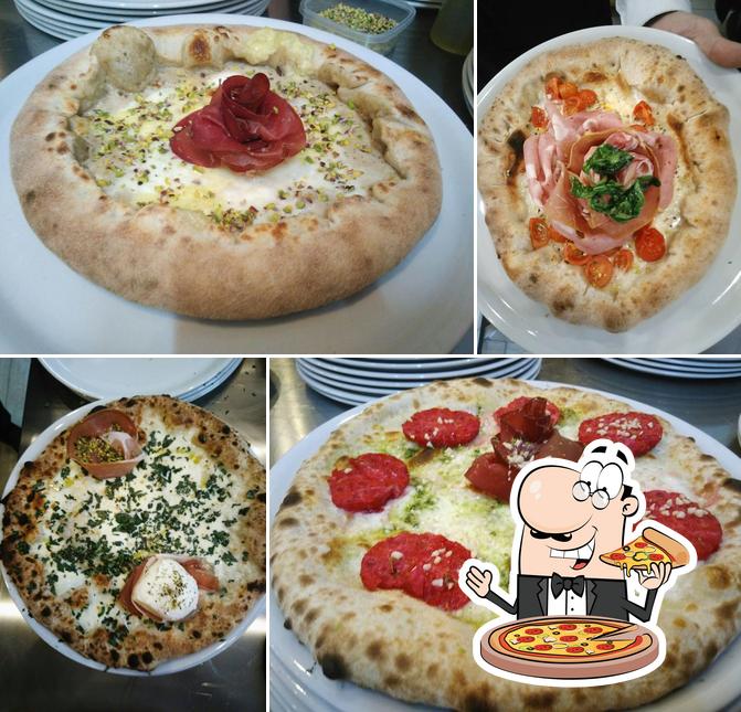 Prenditi una pizza a Ristorante La Bufalella C.Y.C. Sas Di Yovbak Tetyana