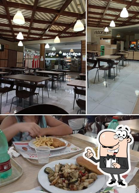 La immagine della interni e tavolo da pranzo di Sarni Bistrò - Centro Commerciale Mongolfiera - Foggia (FG)