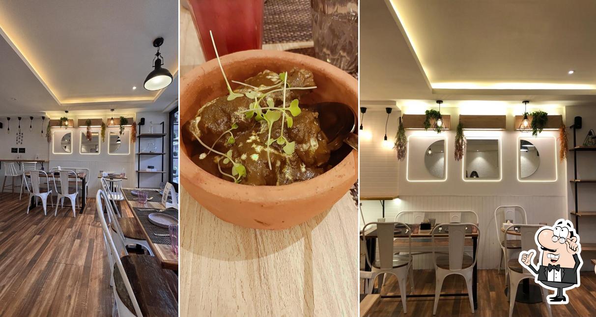 Take a seat at one of the tables at METANOIA RESTRO CAFE